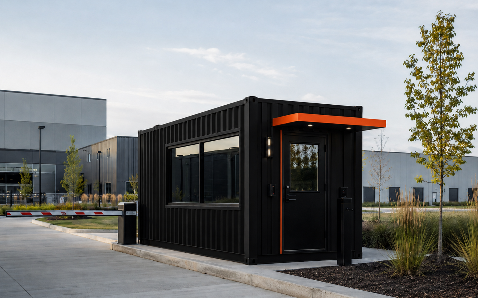 Black and orange business-series container positioned as a logistics yard operations office